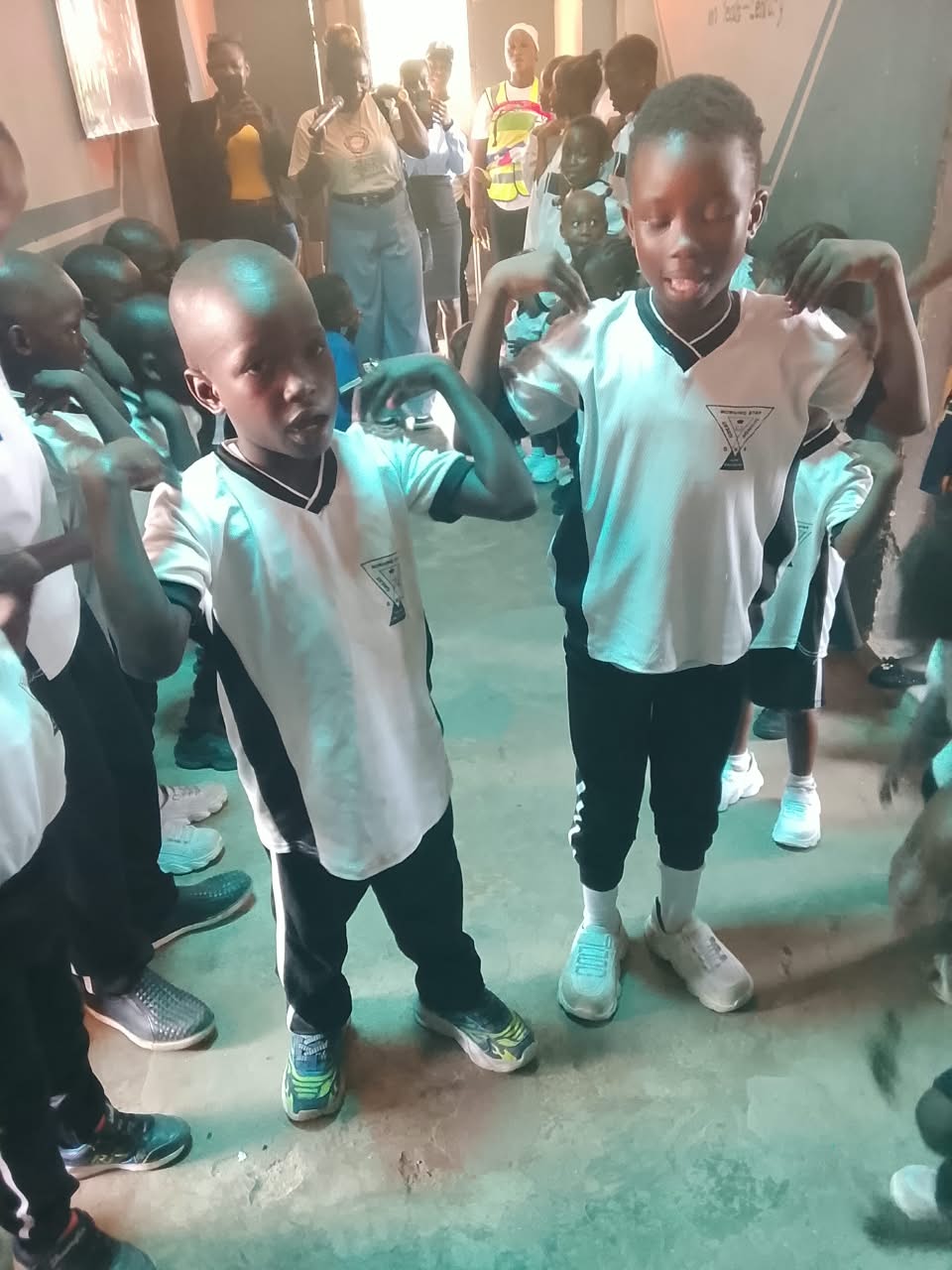 Two pupils taking part in an interactive activity during an OLIC school seminar