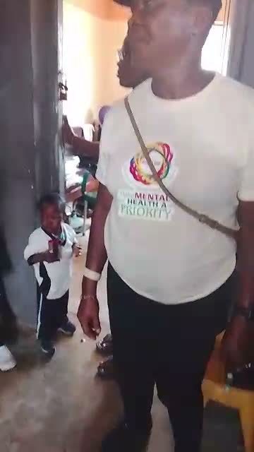 An OLIC team member wearing a 'Make Mental Health a Priority' T-shirt at the seminar